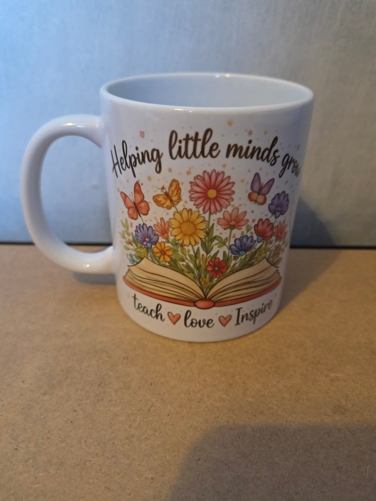 Helping Little Minds Grow Teach Mug